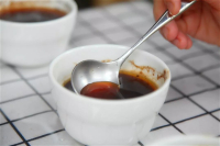 What is the purpose of the exhaust valve on coffee bags? Can you squeeze it to smell the aroma?