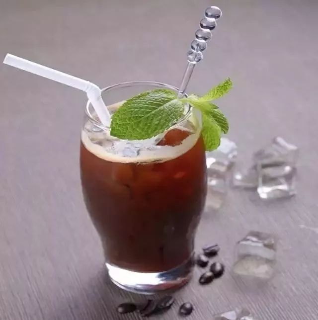 Final coffee beer beverage garnished with mint leaf