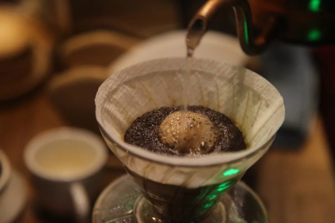 Gentle coffee pouring technique