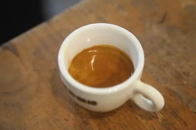Over-extracted espresso with dark color and thick crema