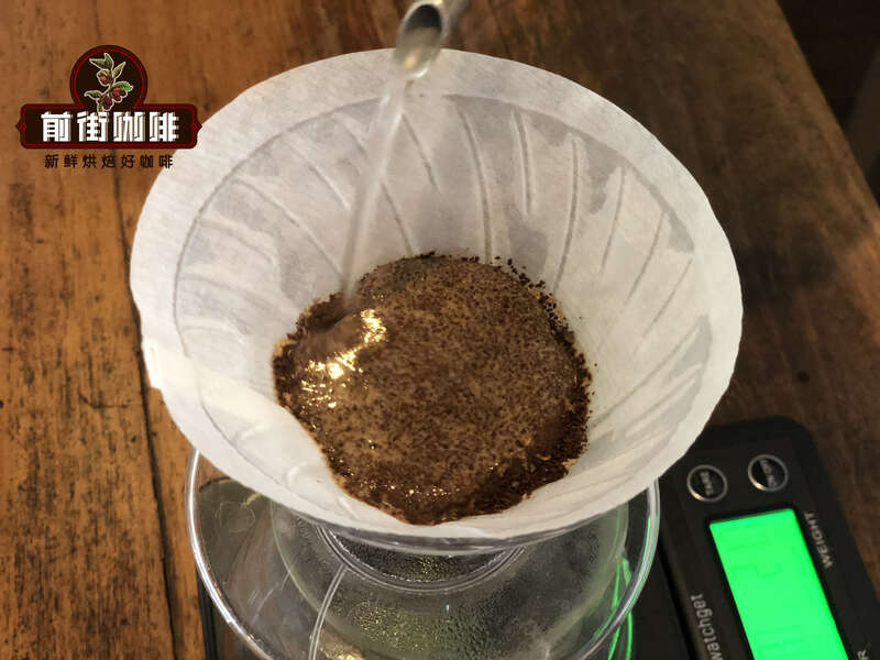 Coffee grounds blooming during the wetting phase of pour-over brewing