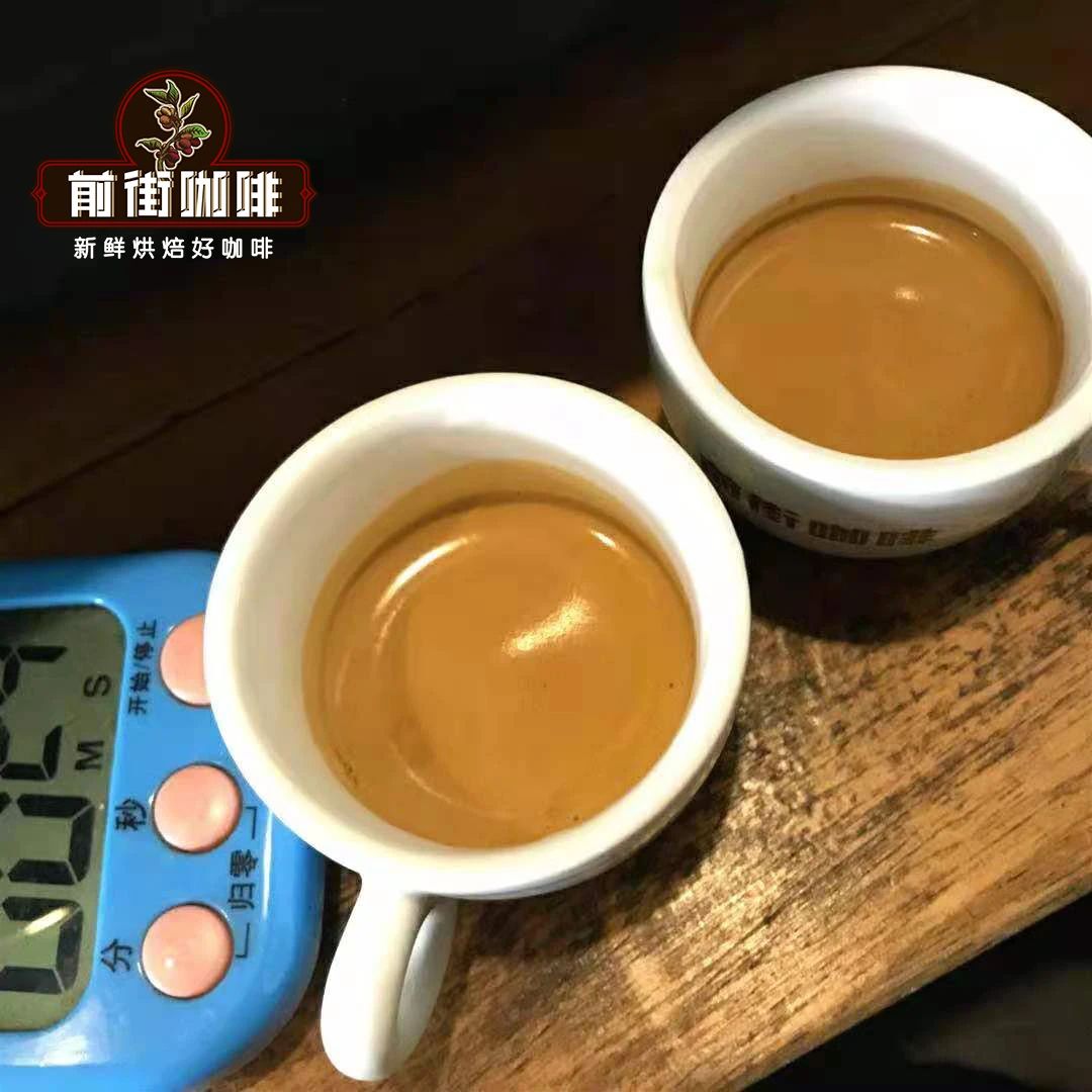 Barista adjusting espresso grinder