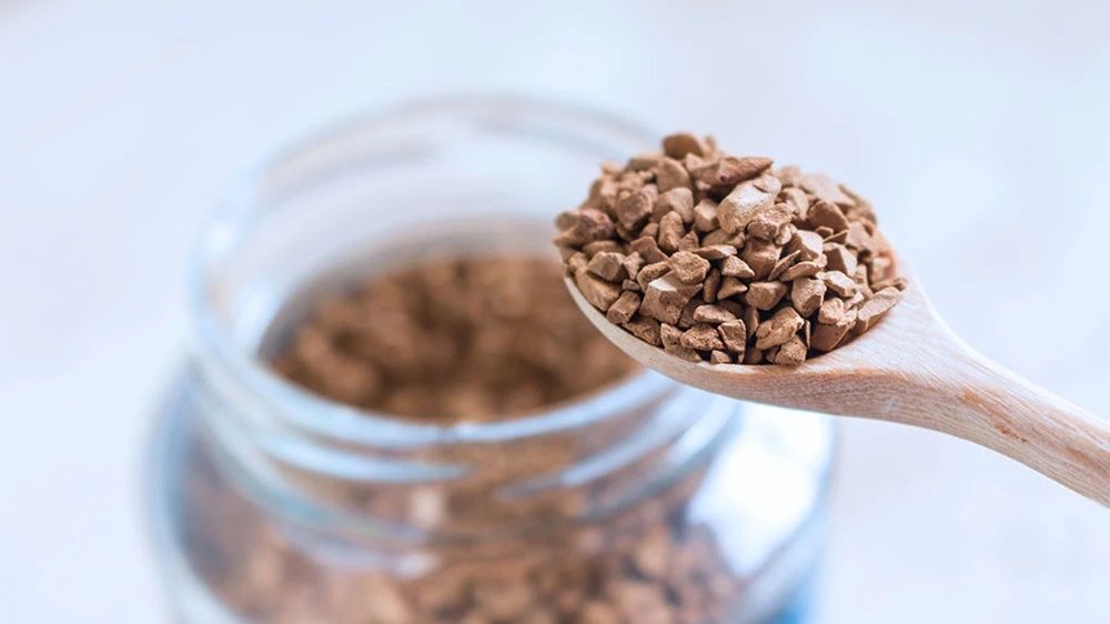Historical photograph of soldiers drinking coffee during World War II