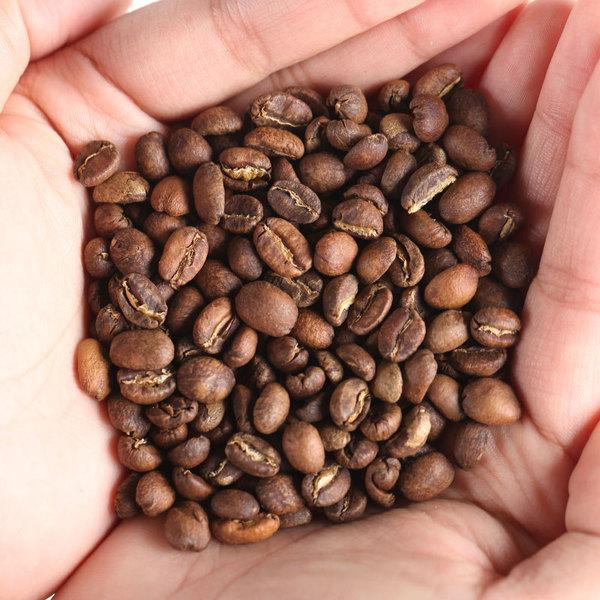 Coffee cherries drying in the sun