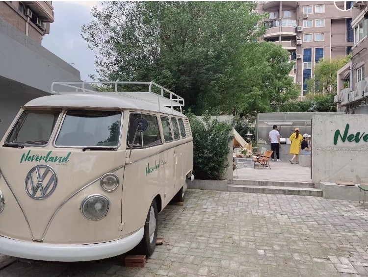 Neverland cafe interior with camping equipment