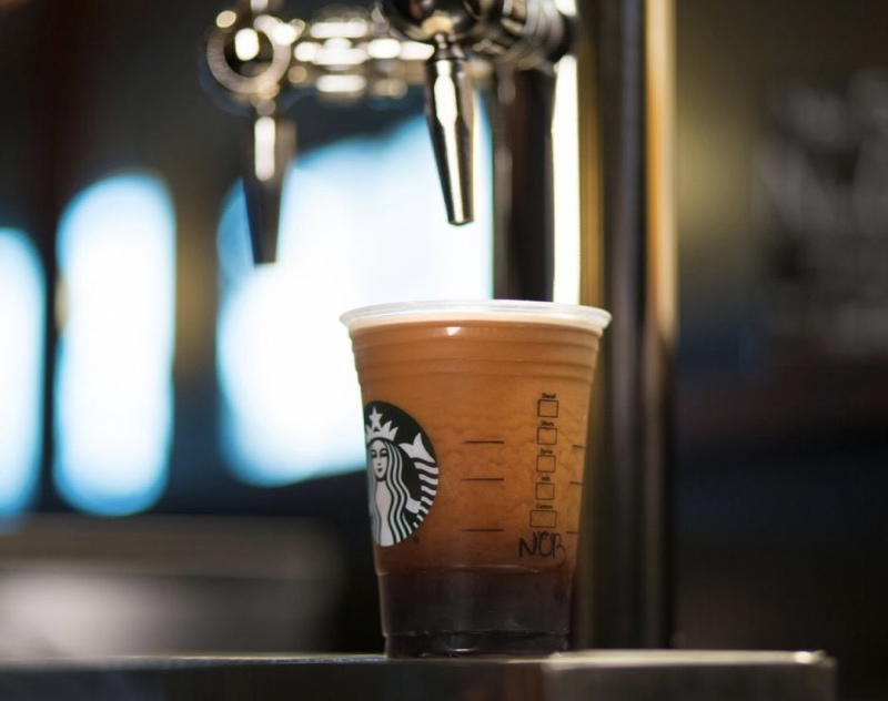 Various coffee syrup bottles lined up