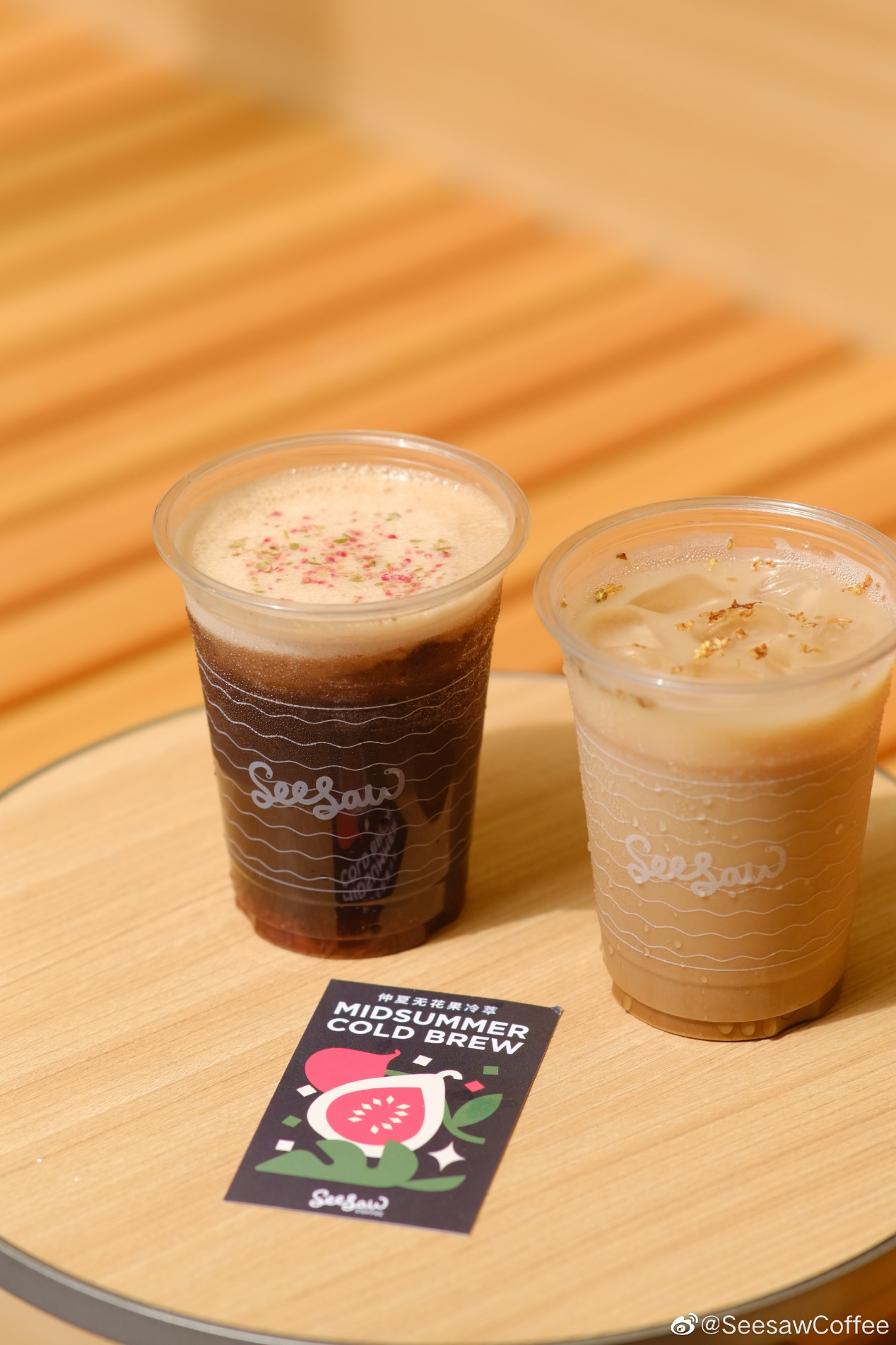 Artistic coffee drinks with fruit and garnishes