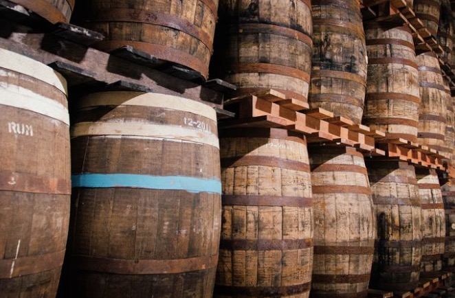 Wine barrel fermentation process for coffee beans