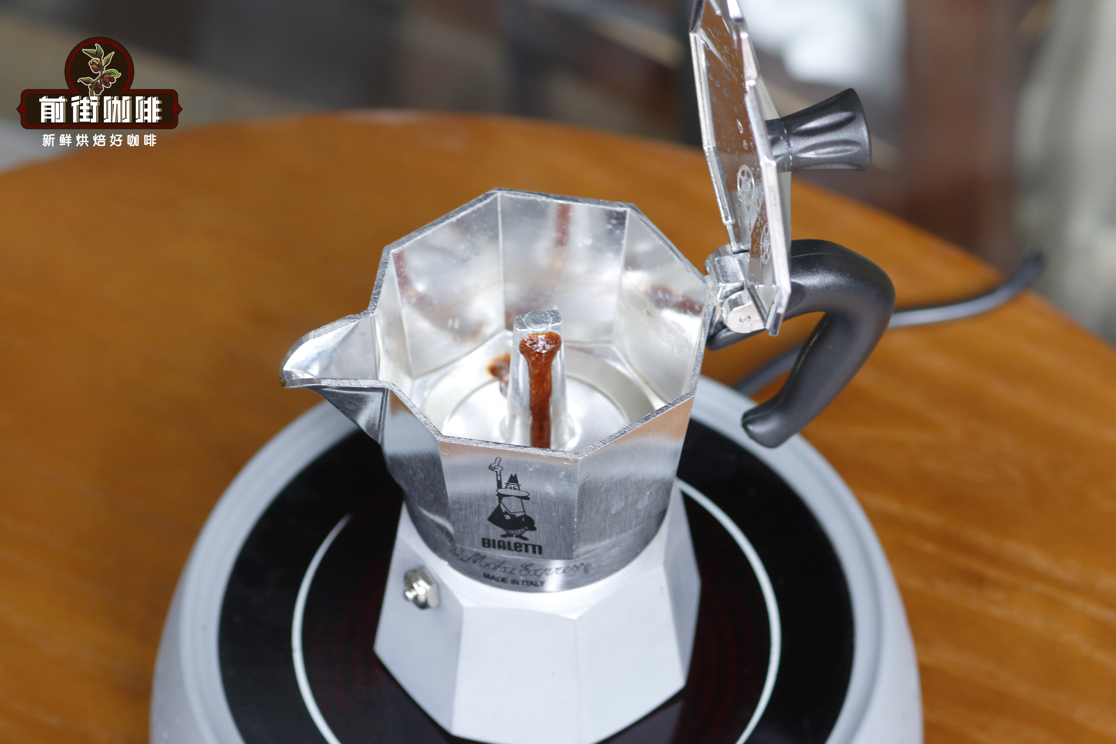 Moka pot brewing coffee